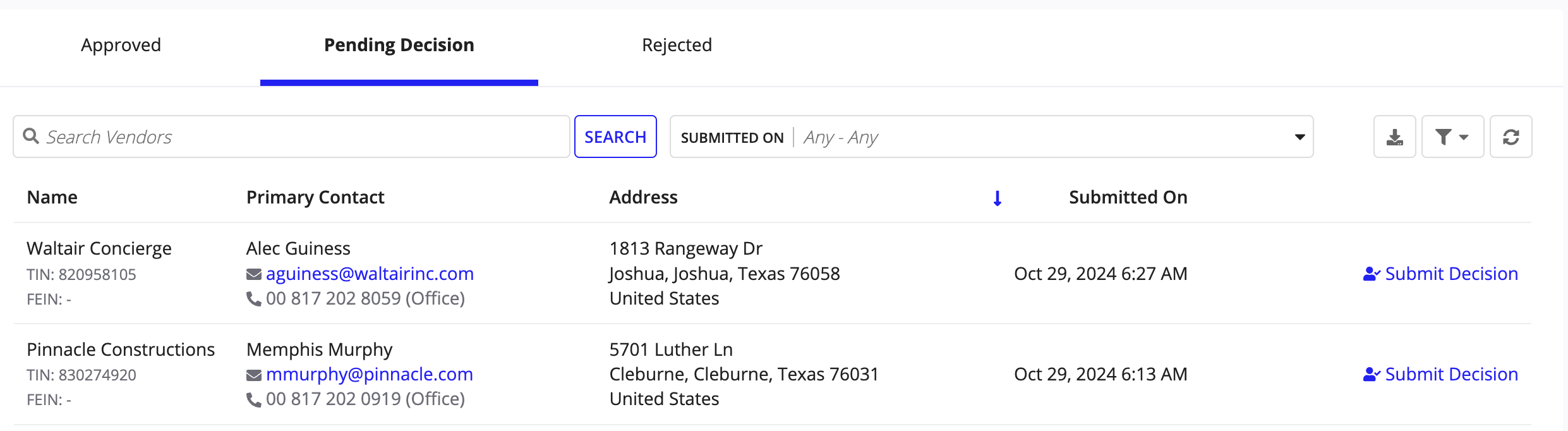 The Pending Decision tab on the Vendors page showing vendors awaiting registration approval, with columns for Name, Primary Contact, Address, and Submitted On.
